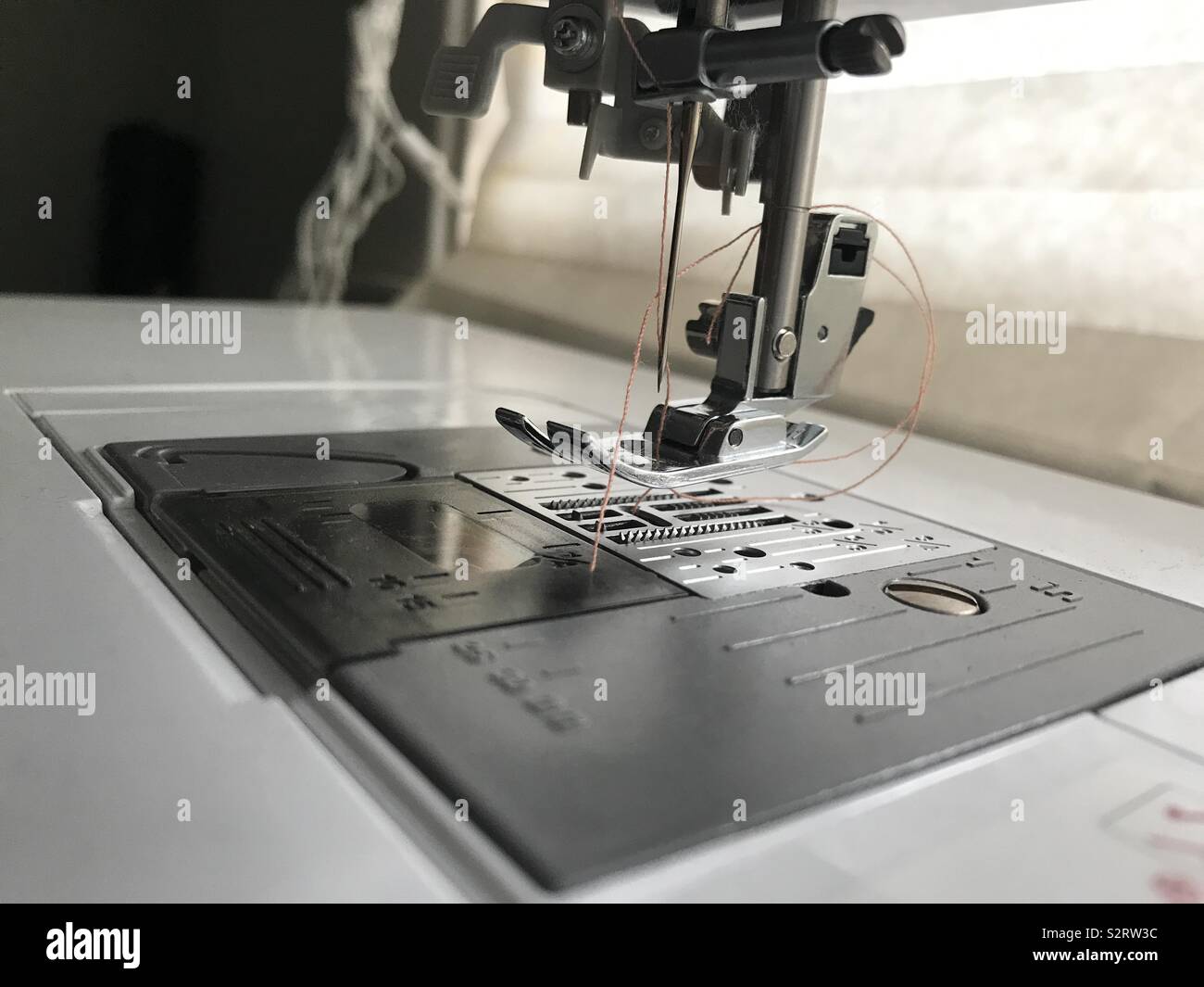 Sewing machine foot Stock Photo Alamy