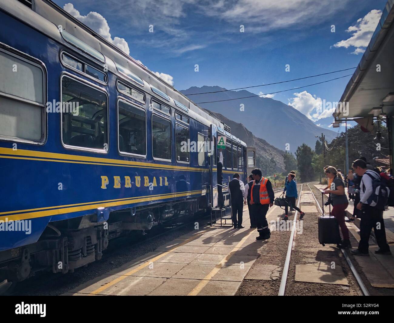 Passengers about to board the Perurail train service from Ollantaytambo to Aguas Calientes (Machupicchu Machu Picchu Pueblo), Perú Peru. - Smartphone Captured Stock Image