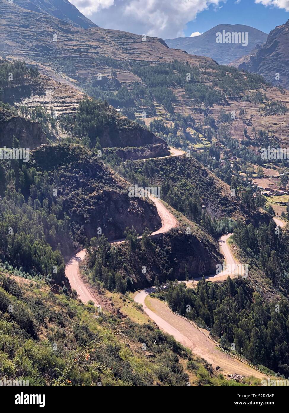 Portrait vertical format. Winding Andean mountain road near Pisaq, Perú Peru. - Smartphone Captured Stock Image