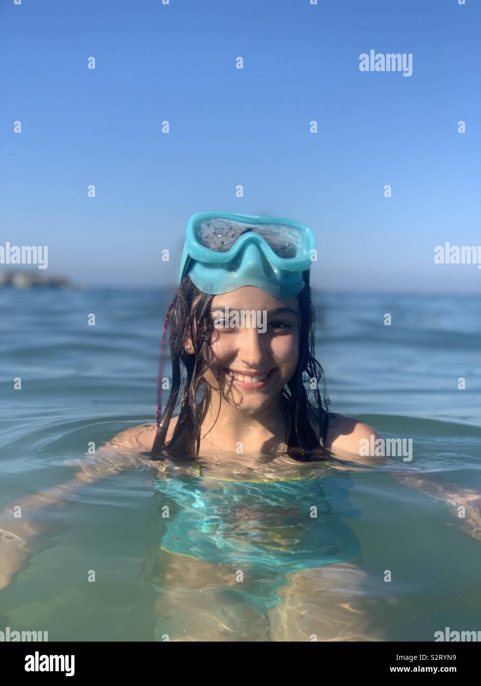 Ten years old girl portrait in the sea Stock Photo