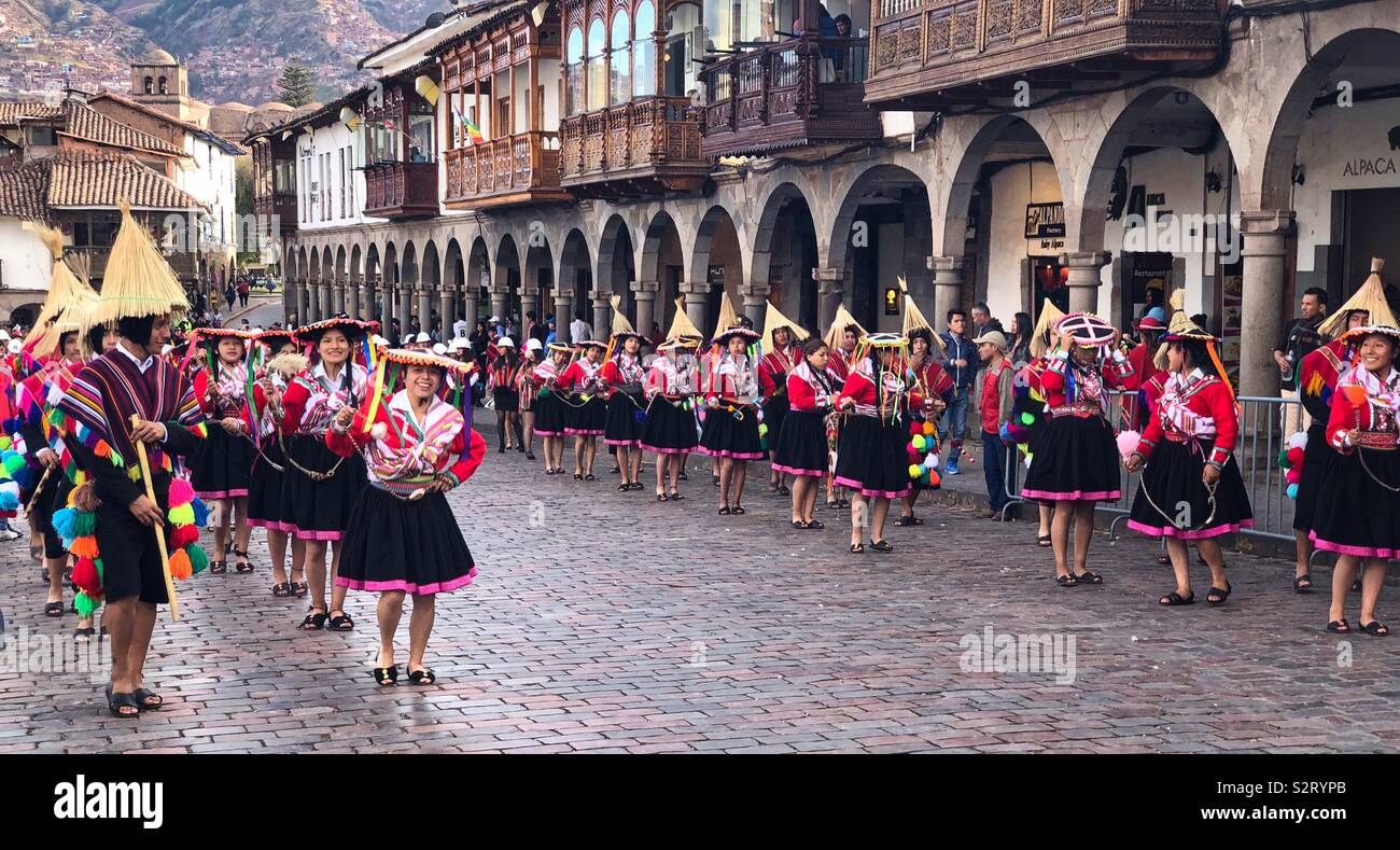 Young men & women dressed in colourful colorful costumes for the Inti Raymi Raymi’rata sun festival in Cusco Cuzco, Perú Peru. The festival lasts most of June and celebrates the winter solstice. - Smartphone Captured Stock Image