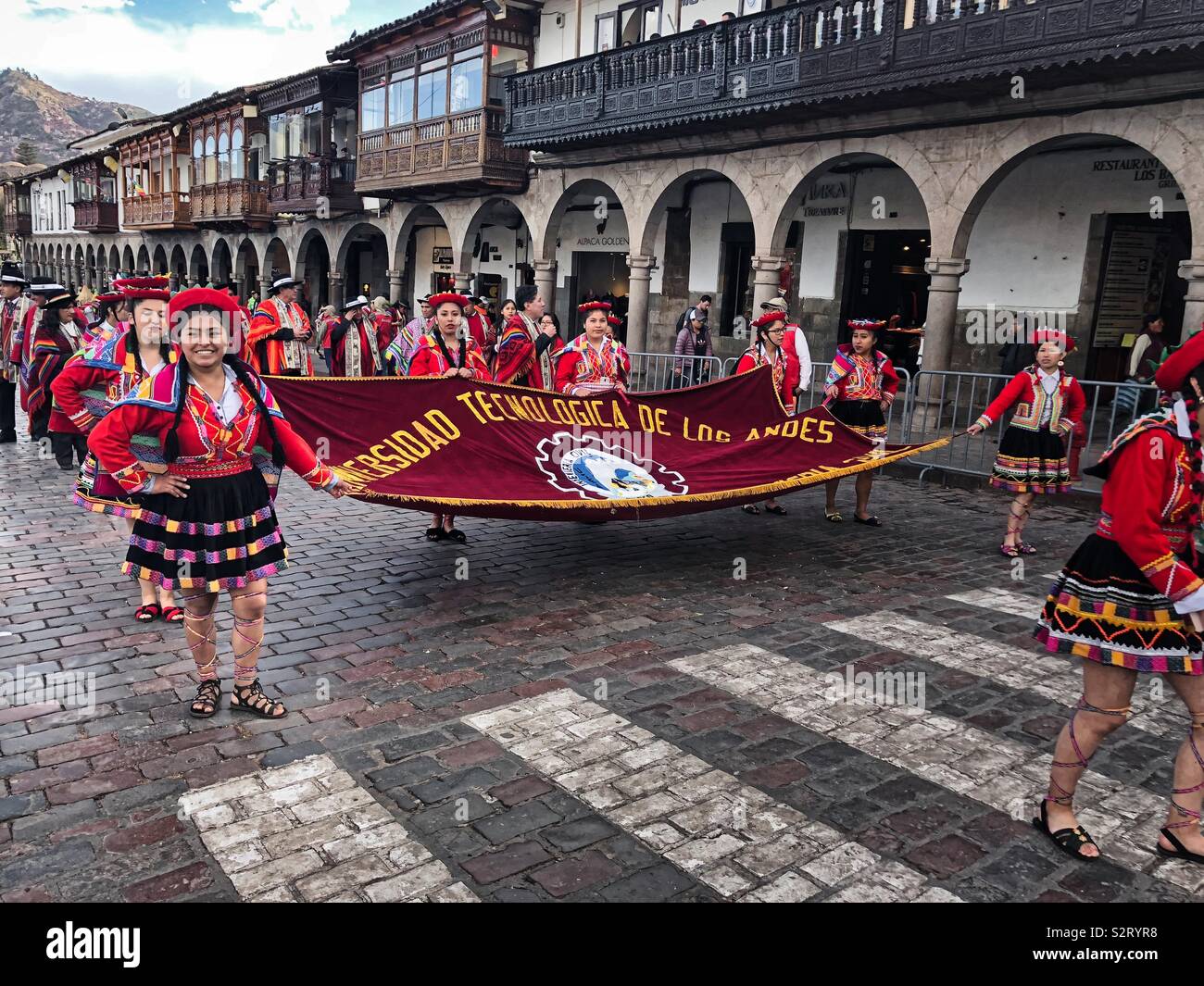 Technical University of the Andes students in colourful colorful costumes for the Inti Raymi or Inti Raymi’rata sun festival celebrating the winter solstice. Cusco Cuzco Perú Peru June 2019. - Smartphone Captured Stock Image