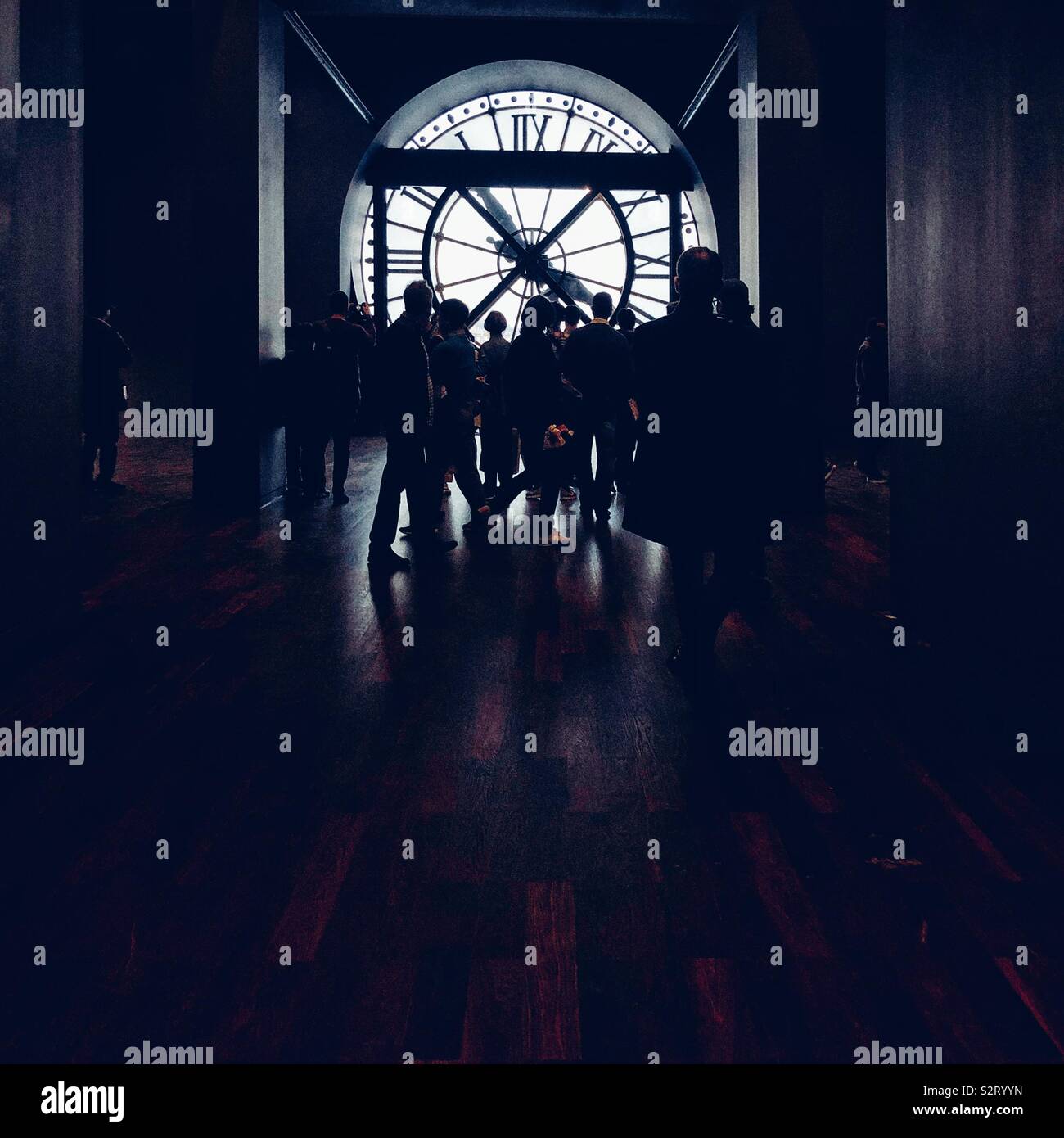 Crowds of people in front of famous clock at Musée d' Orsay  in Paris Stock Photo
