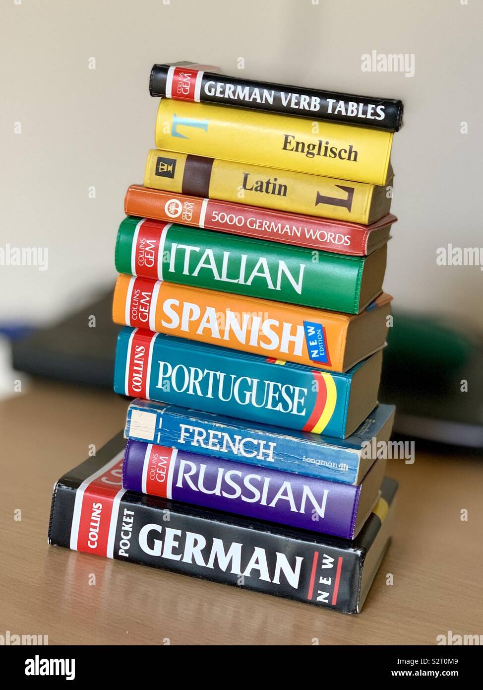 A pile of English to other language dictionaries. Many languages Stock