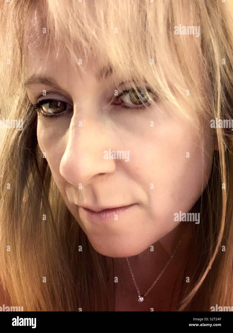 Portrait of blonde woman. - Smartphone Captured Stock Image