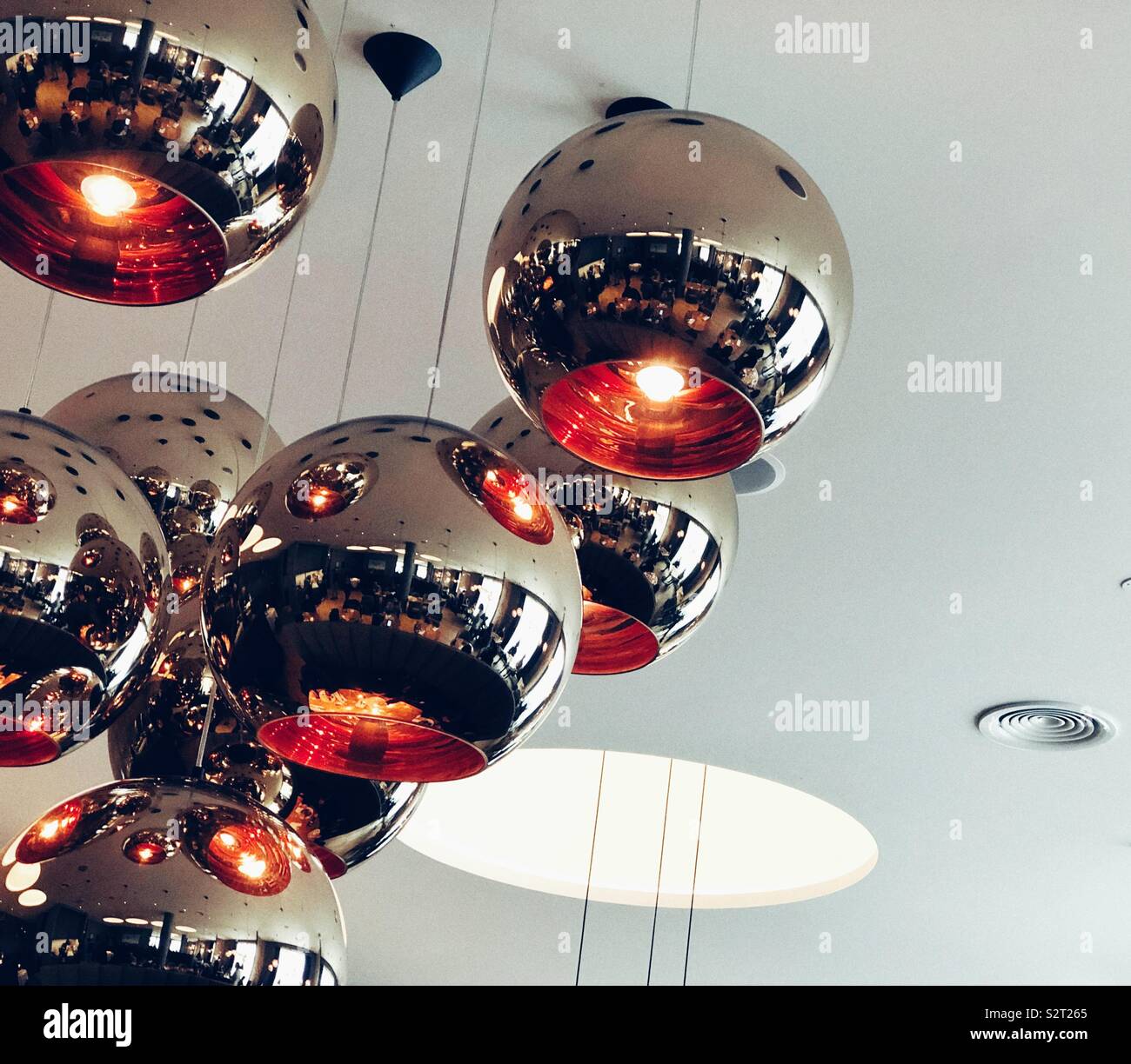 Modern light fixtures hanging from the ceiling in hotel in Reykjavik Stock Photo