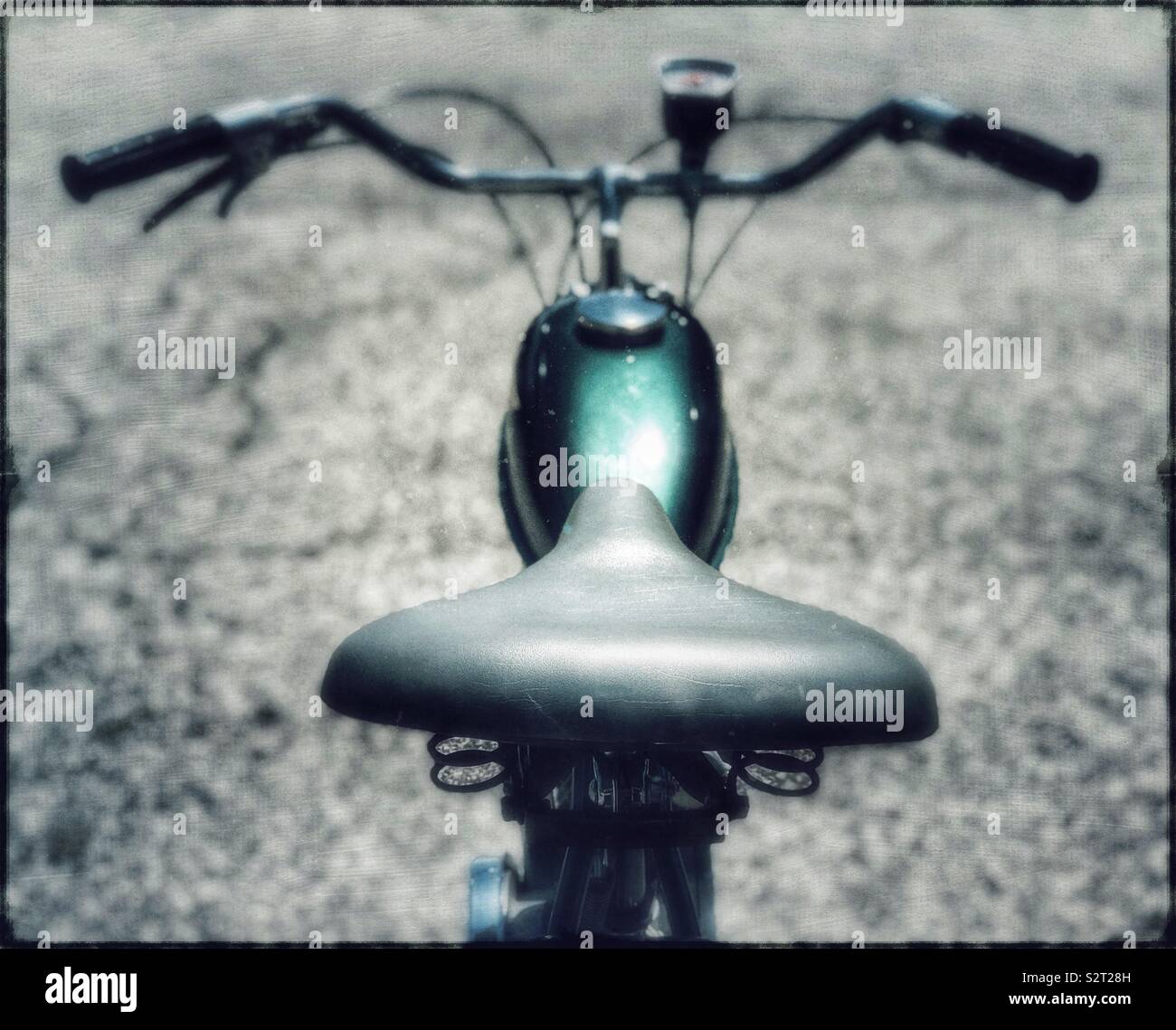Green Whizzer motorized bicycle - Smartphone Captured Stock Image
