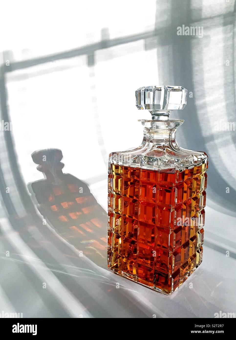 Decanter filled with premium whiskey, USA - Smartphone Captured Stock Image