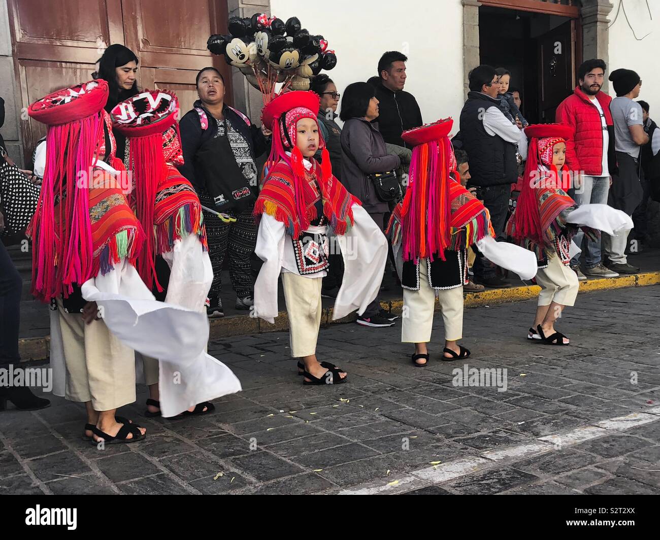 Colourfully dressed Peruvian children preparing for their Inti Raymi or Inti Raymi’rata sun festival parade. Incan celebration of the winter solstice. Cusco Cuzco Perú Peru. - Smartphone Captured Stock Image