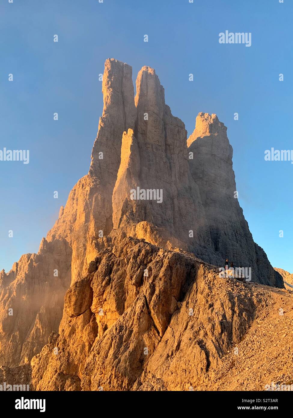 Sunset on the Vajolet Towers, Rosengarten Group, Italy. Stock Photo