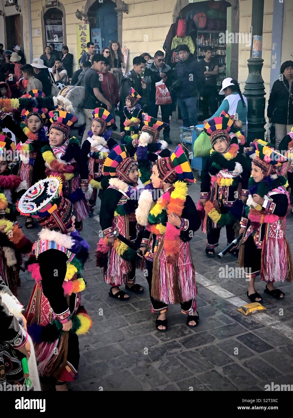 Colourfully dressed Peruvian children on the sun festival parade for the winter solstice. Inti Raymi’rata Raymi Incan celebration in Cusco Cuzco Perú Peru. - Smartphone Captured Stock Image