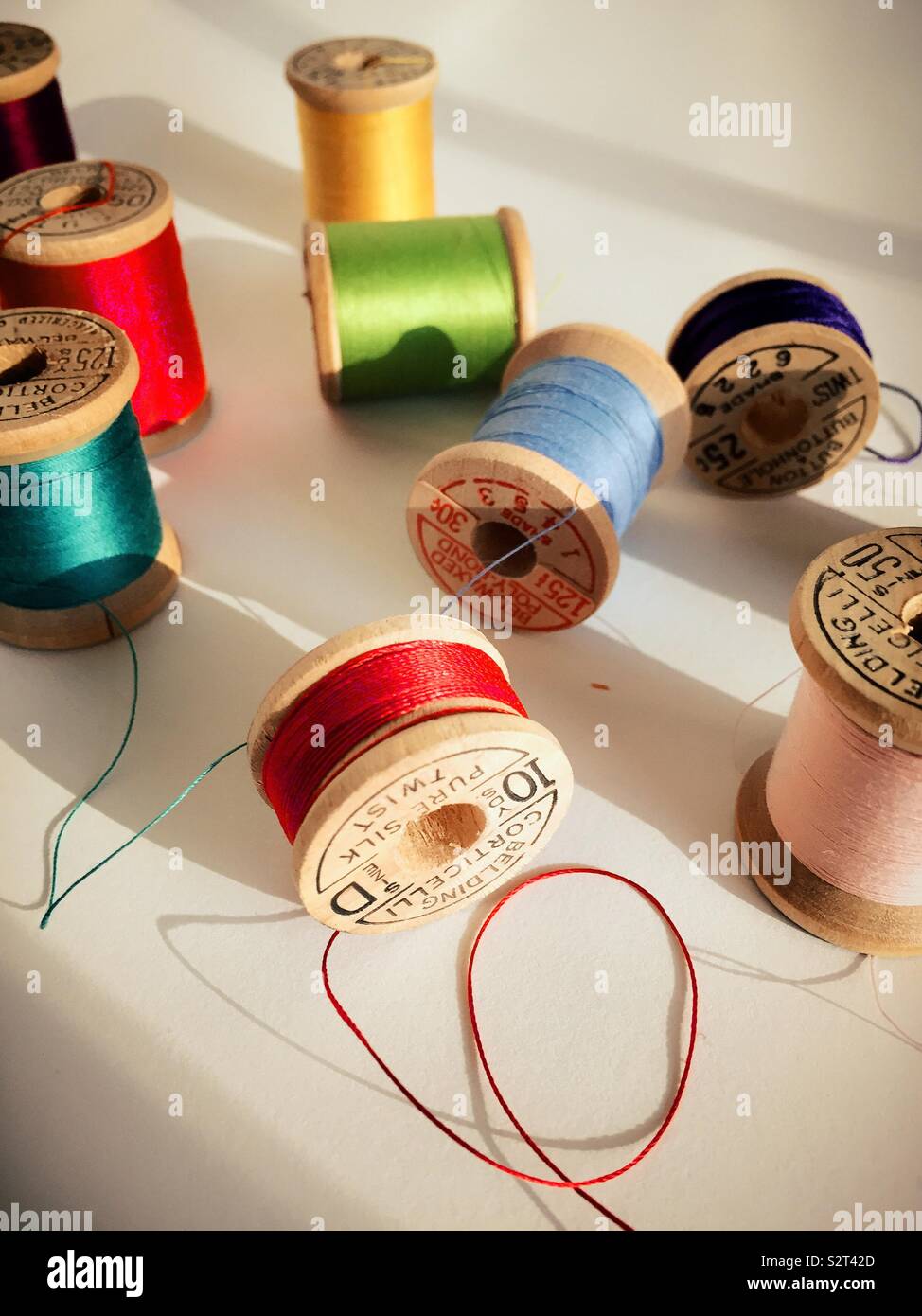 I put my Ritza 25 Tiger thread on vintage/antique wooden spools