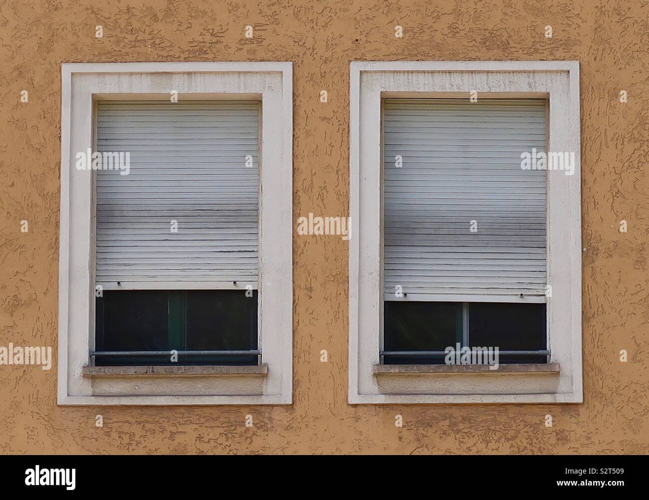Windows with half closed shutters Stock Photo Alamy