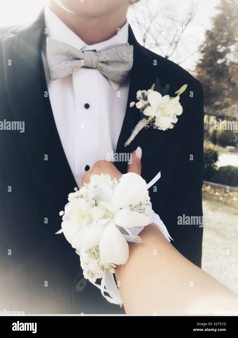 Prom white corsage with silver and white boutonni re with silver