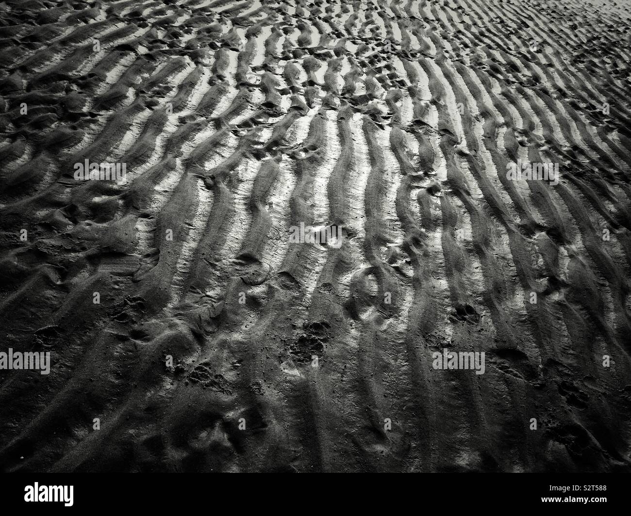 Black and White of sandy beach in Talacre on the north coast of Wales in the community of Llanasa. United Kingdom - Smartphone Captured Stock Image