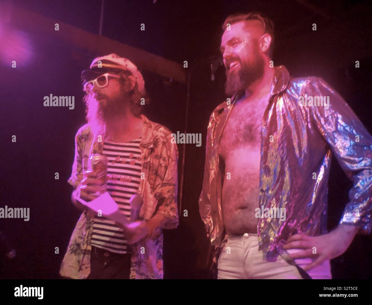 Emcee and winner at the Air GUITAR Boston regional competition where winner gets to compete at National Air Guitar championship in Nashville - Smartphone Captured Stock Image