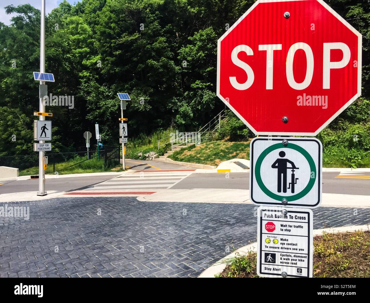 Solar panels and STOP sign for cyclists - Smartphone Captured Stock Image