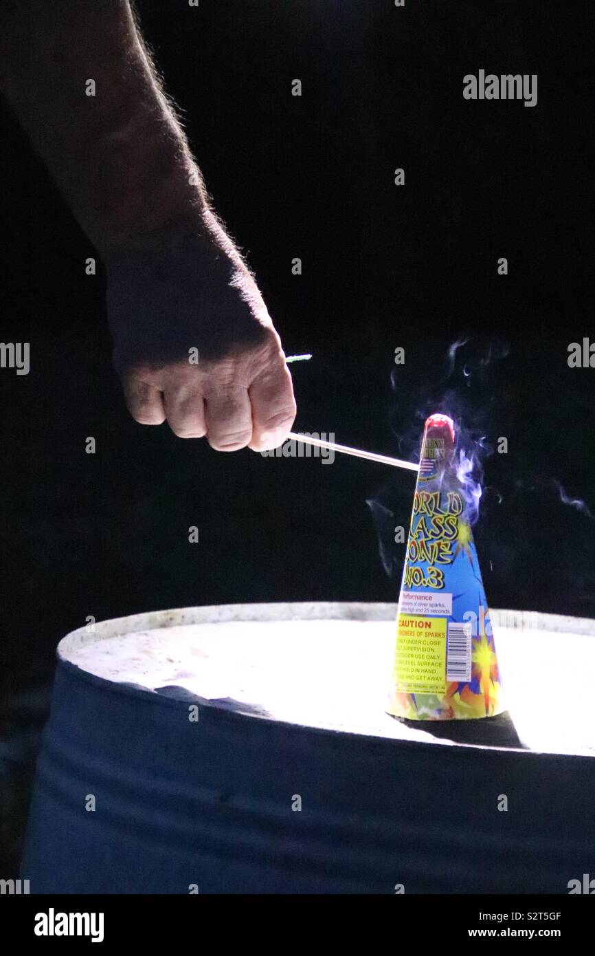 Lighting fireworks for excitement and show Stock Photo Alamy