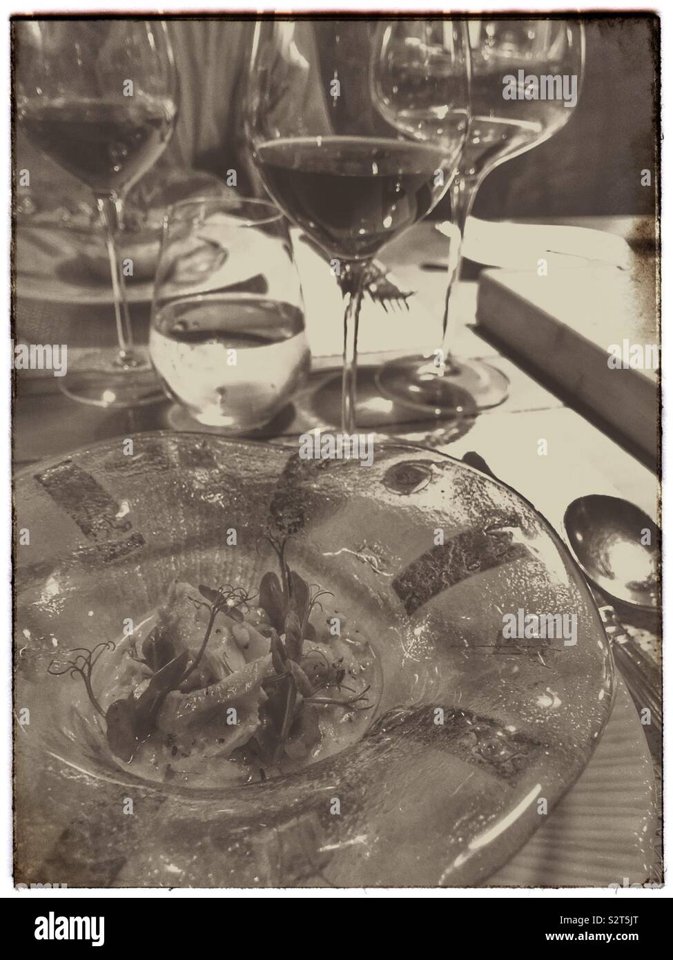 Fine dining at Aubergine restaurant in Cape Town, South Africa. - Smartphone Captured Stock Image