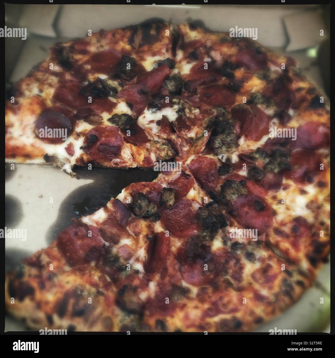 Pepperoni sausage bacon pizza Stock Photo Alamy
