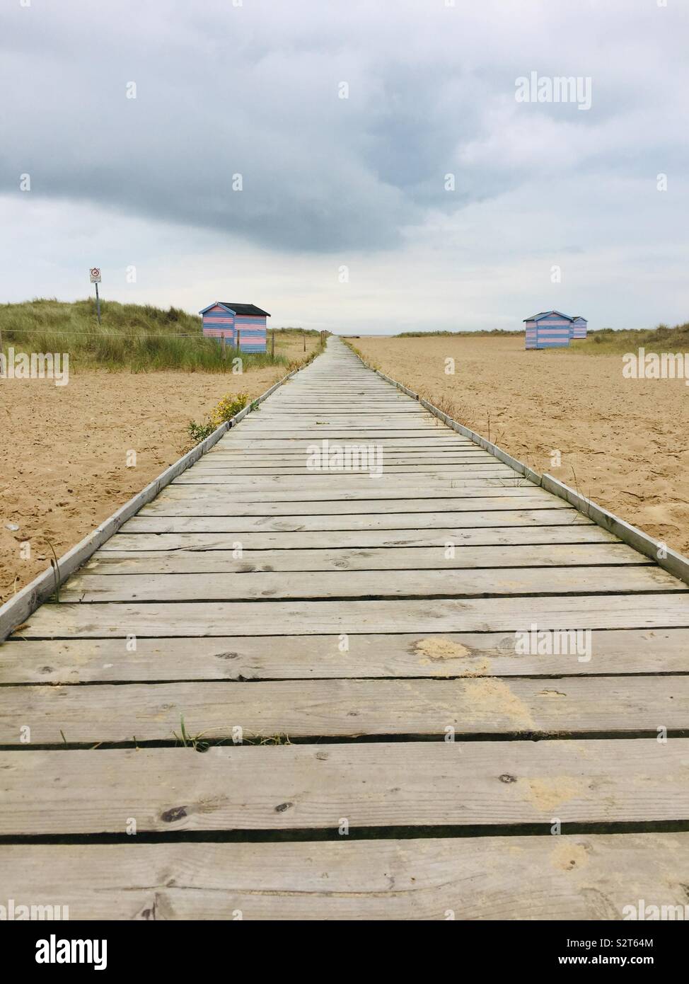 Wooden boardwalk path on beach in Great Yarmouth (Norfolk England) - Smartphone Captured Stock Image