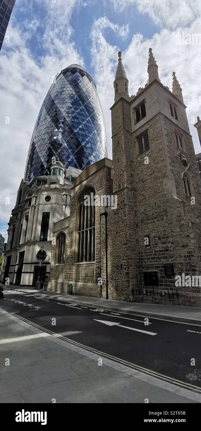 St Katharine Cree C of E Church and the modern ‘Gherkin’ building in London - Smartphone Captured Stock Image