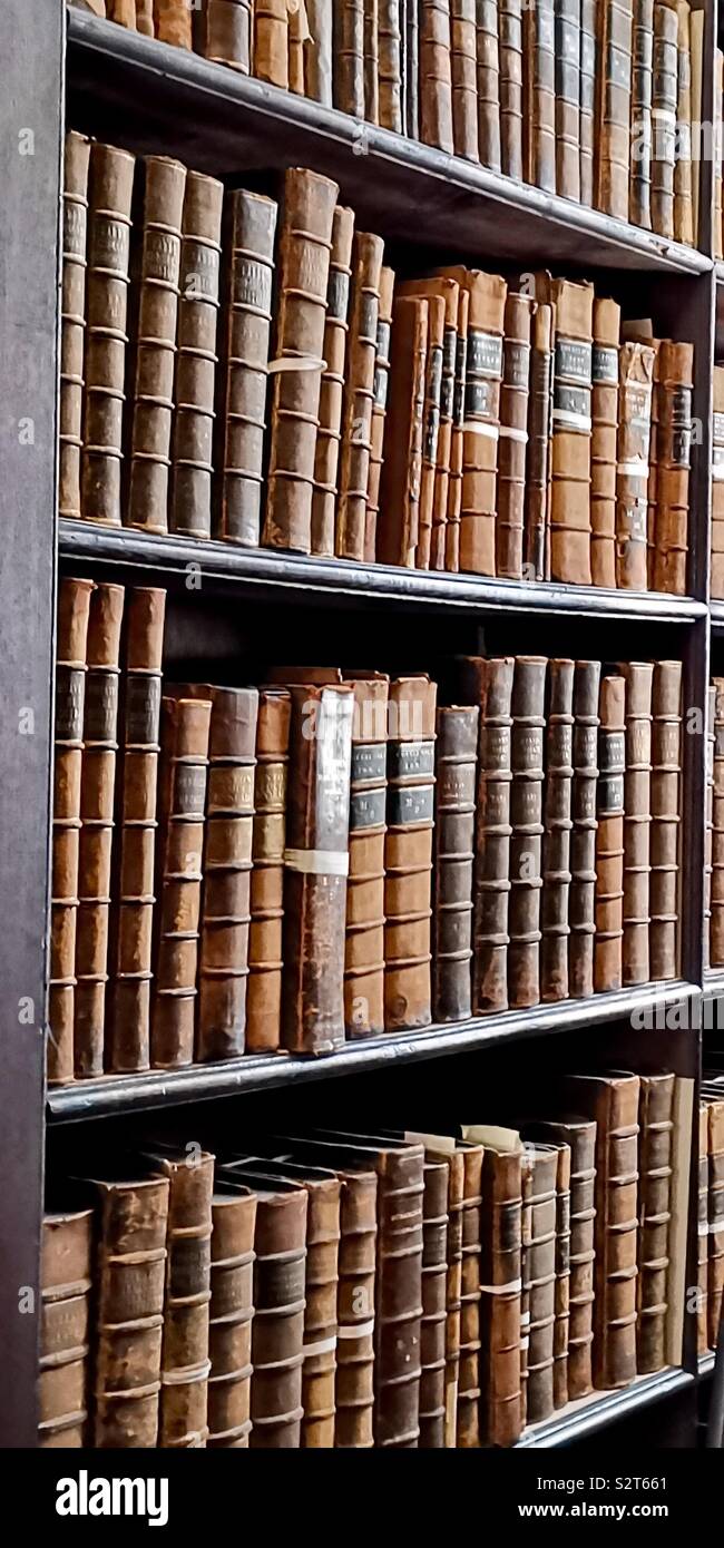 Old books at the library of Trinity College in Dublin. - Smartphone Captured Stock Image