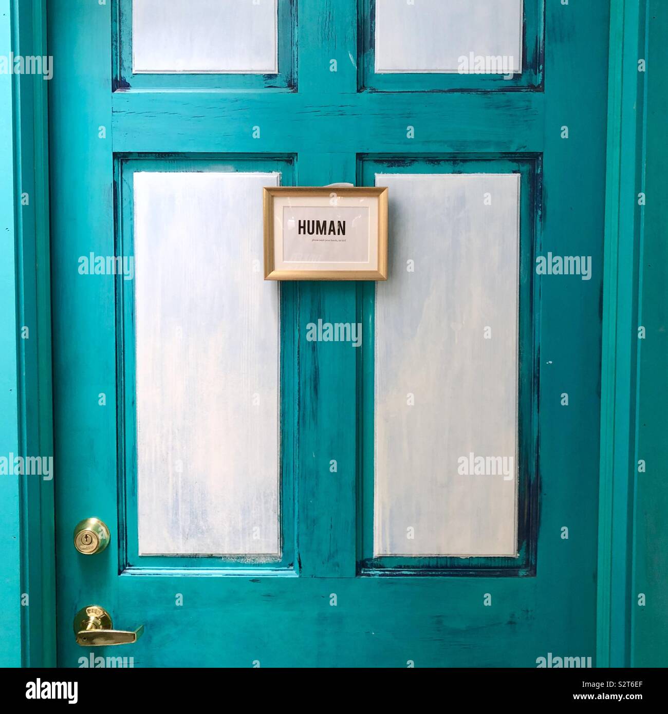 Blue bathroom door all genders Stock Photo Alamy