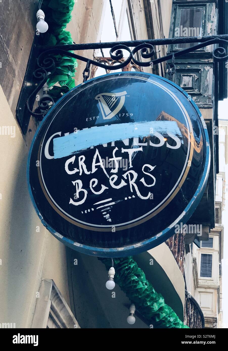 Guinness sign painted over replaces with craft beers Stock Photo