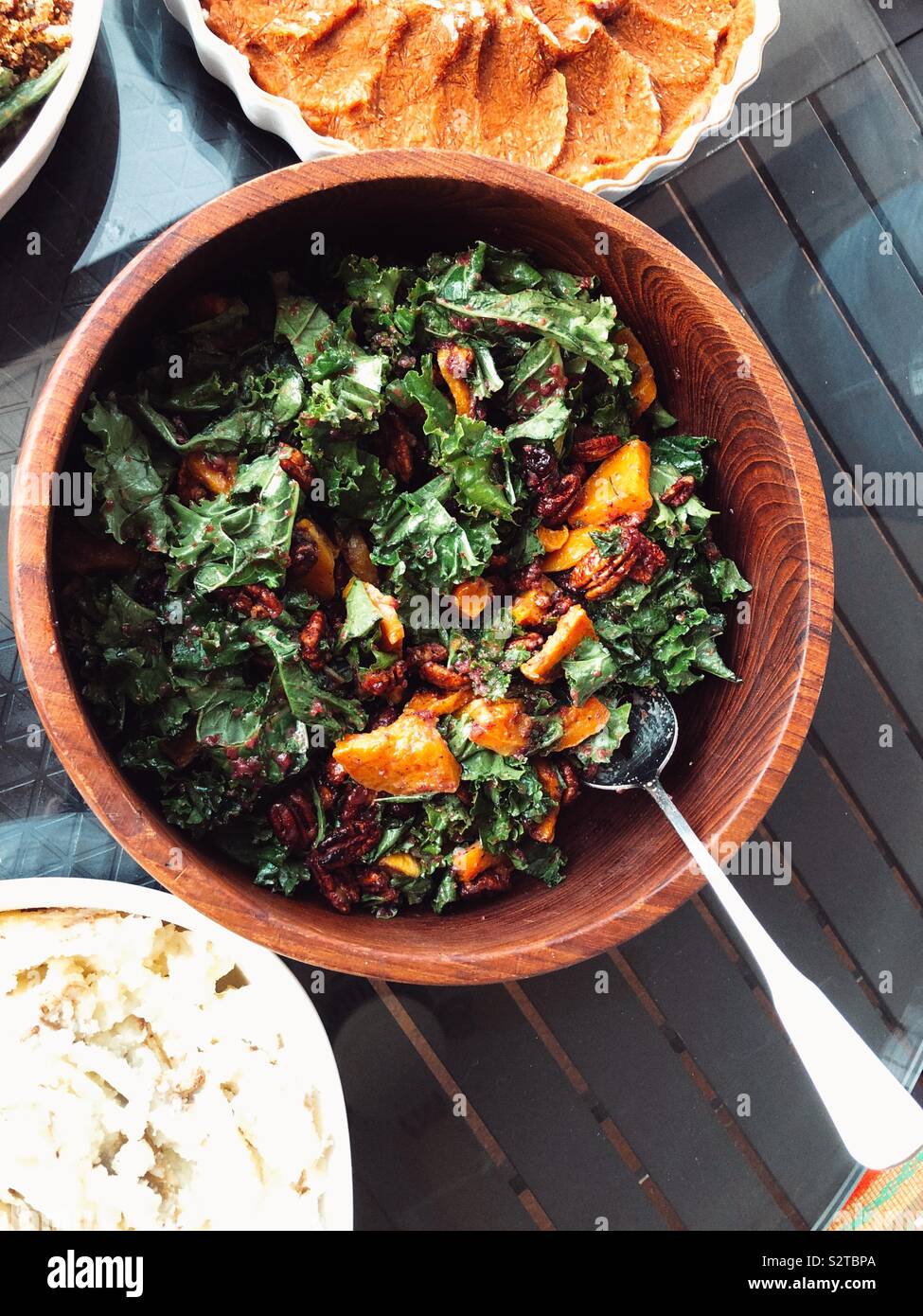 Kale and delicata squash salad for Thanksgiving feast Stock Photo