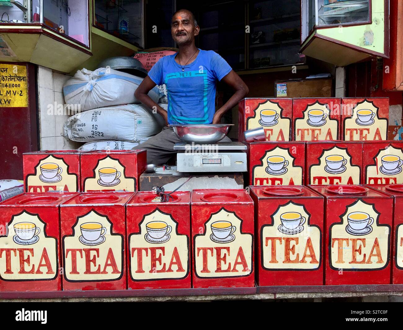 A Indian Tea store with the owner in the background Stock Photo