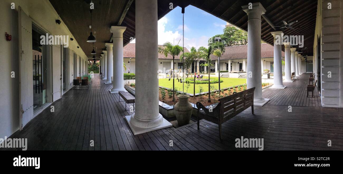 Panorama of the internal courtyard and collonades of the Old Courthouse, completed in 1874, in the Waterfront precinct, Kuching, Sarawak, Malaysia - Smartphone Captured Stock Image