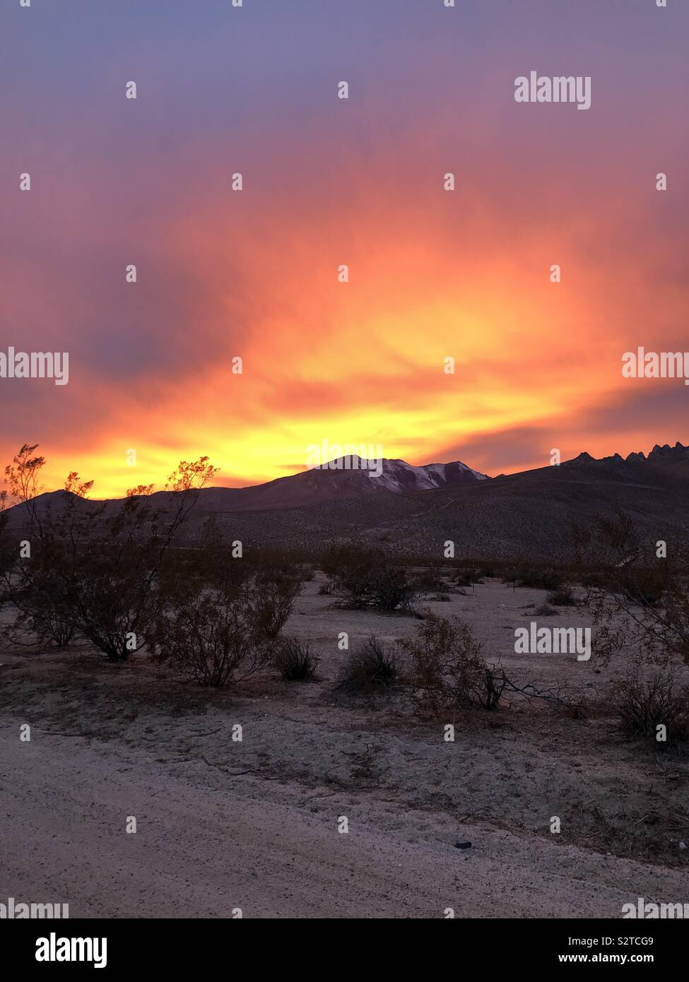 Sunset over the Eastern Sierra mountains near Inyokern, California. Stock Photo