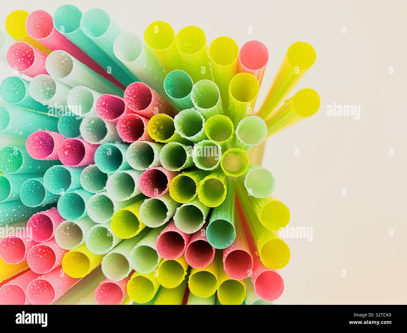 Plastic drinking straws with white background Stock Photo
