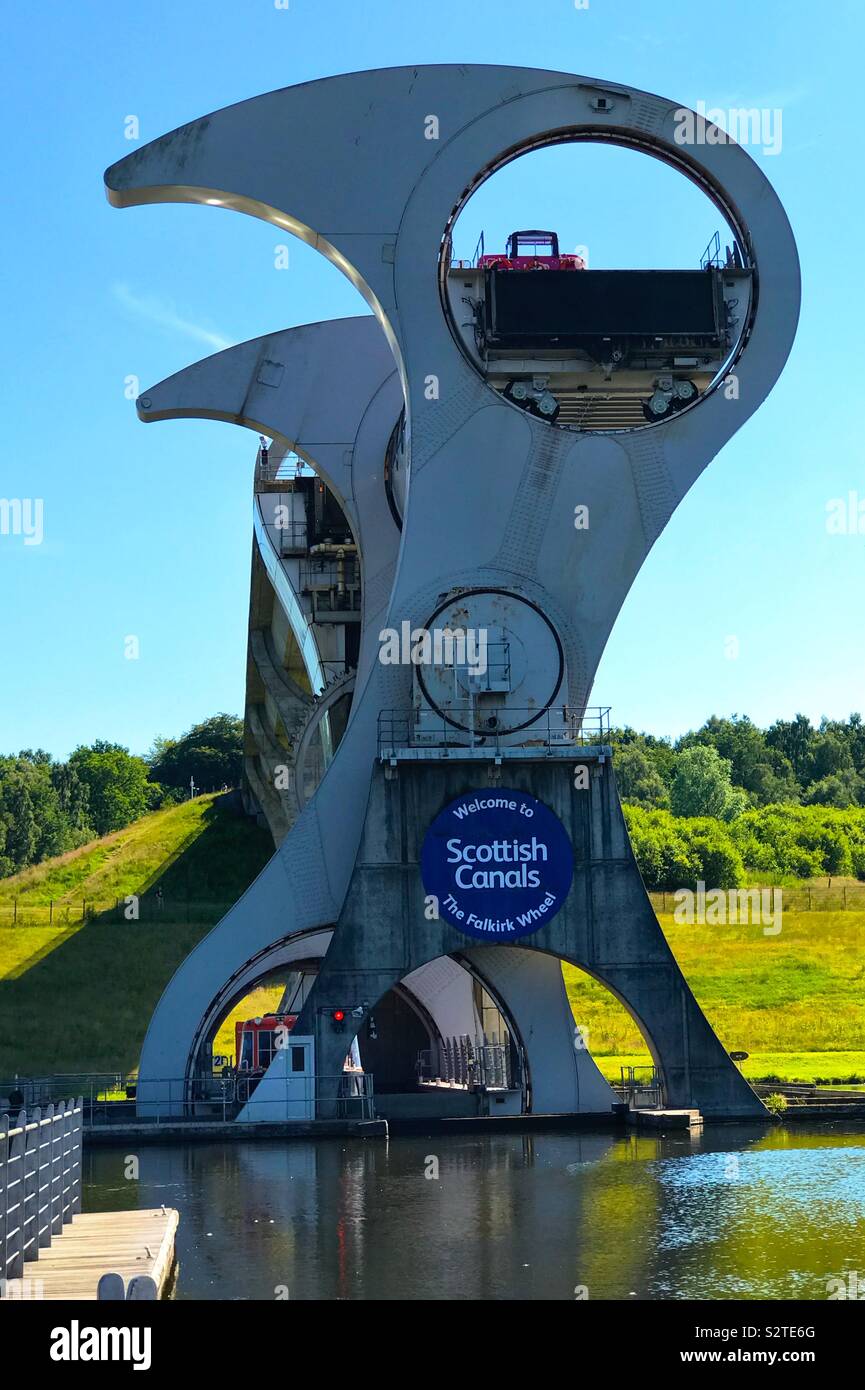 The Falkirk Wheel in central Scotland. A rotating boat lift connecting the Forth and Clyde Canal with the Union Canal. The only rotating boat lift of its kind in the world. Stock Photo