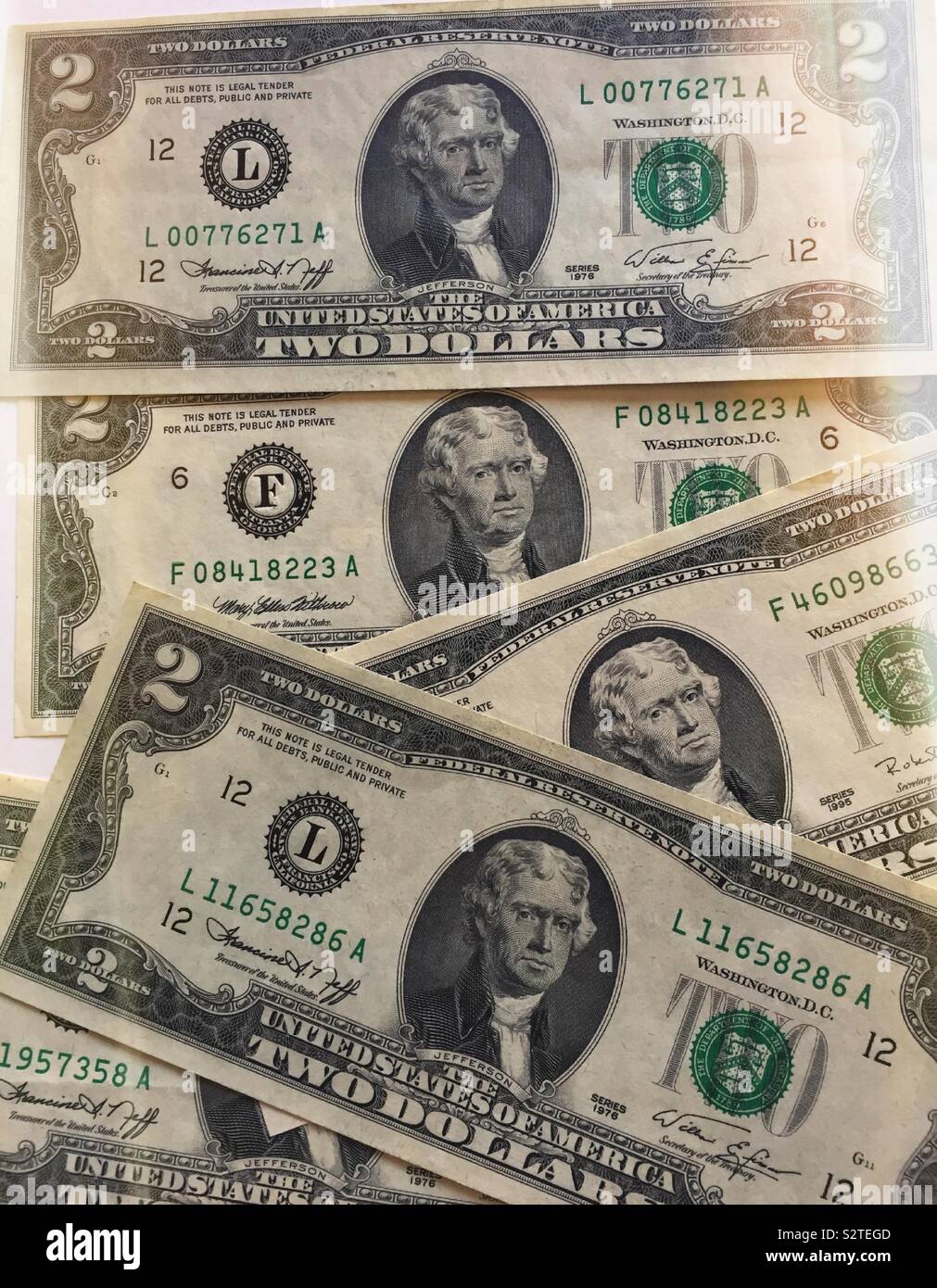 US two dollar bills close up on a white background, USA - Smartphone Captured Stock Image