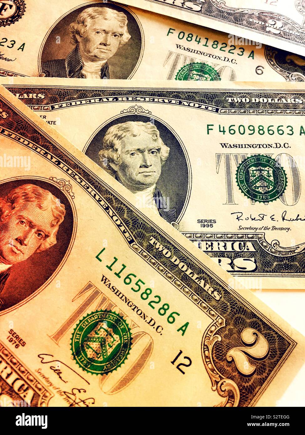 Group of US two dollar bills on a white background close up, United States - Smartphone Captured Stock Image