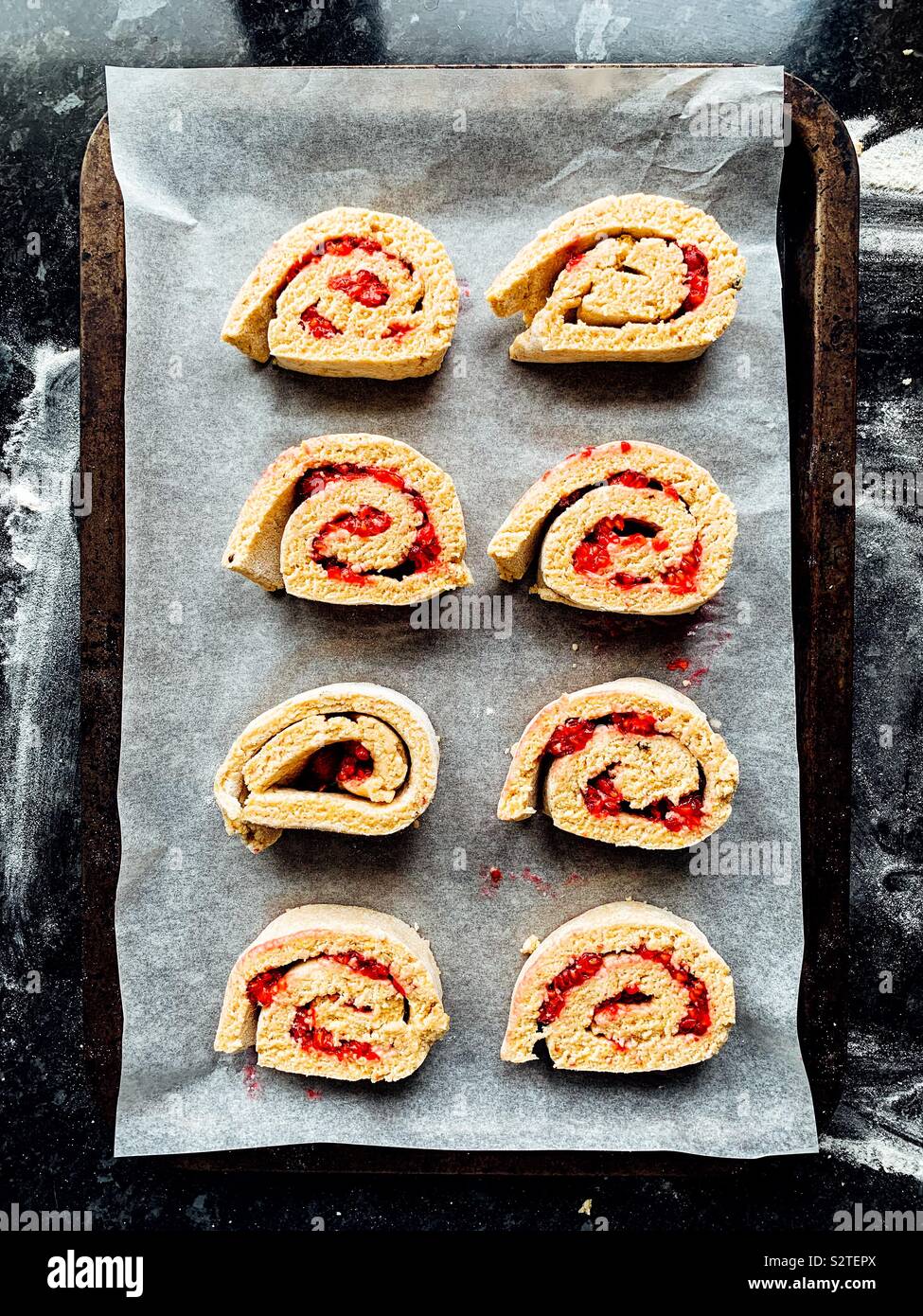 Raspberry, polenta and pink peppercorns scrolls - Smartphone Captured Stock Image