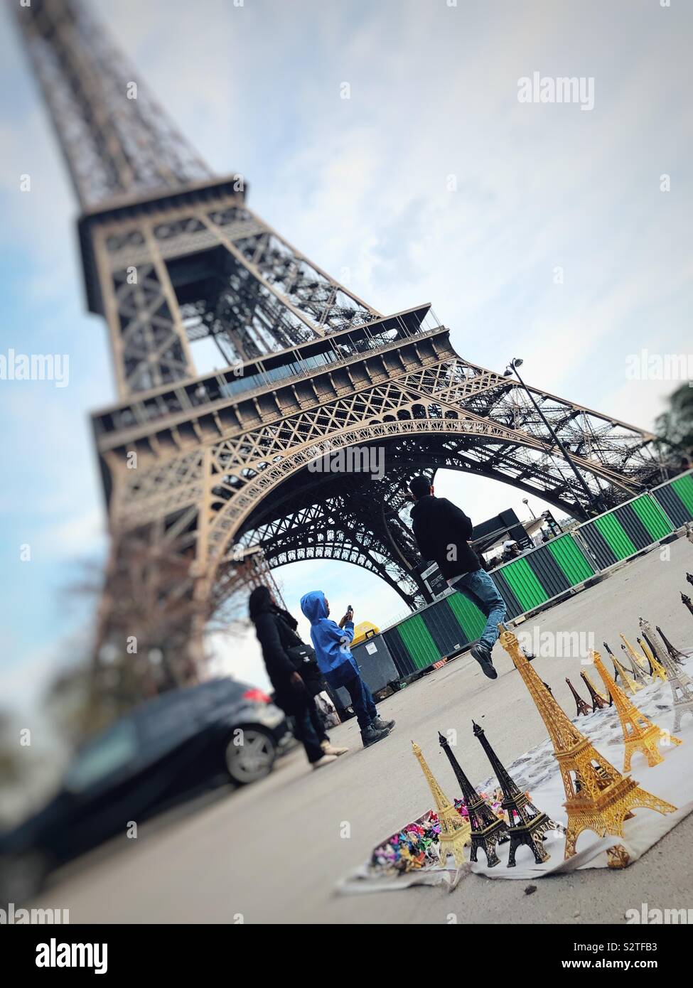 Souvenirs at the foot of Eiffel Tower in Paris Stock Photo