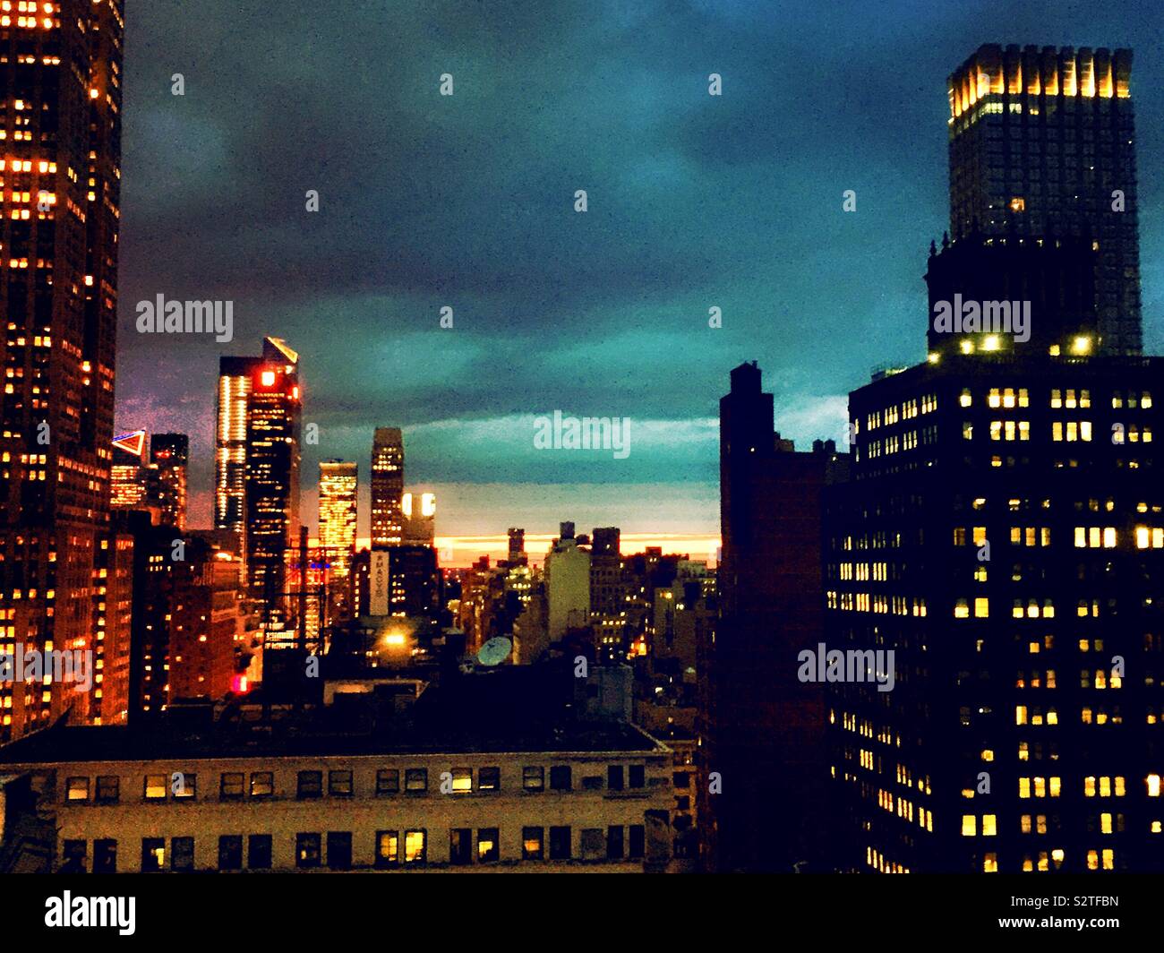 A colorful sunset over Midtown Manhattan, NYC, USA - Smartphone Captured Stock Image
