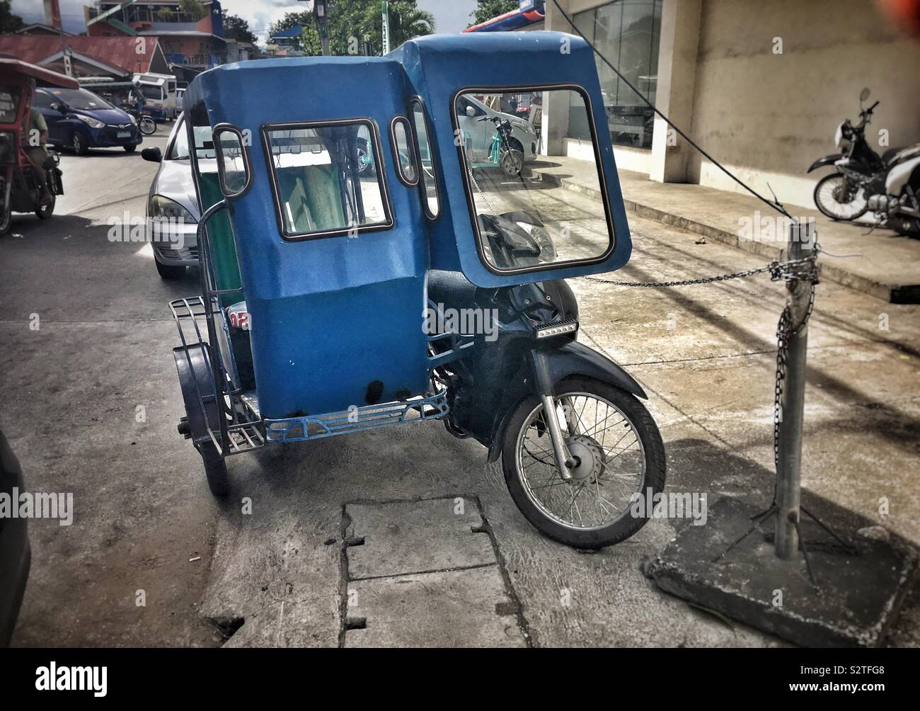 Blue Filipino tricycle Stock Photo Alamy