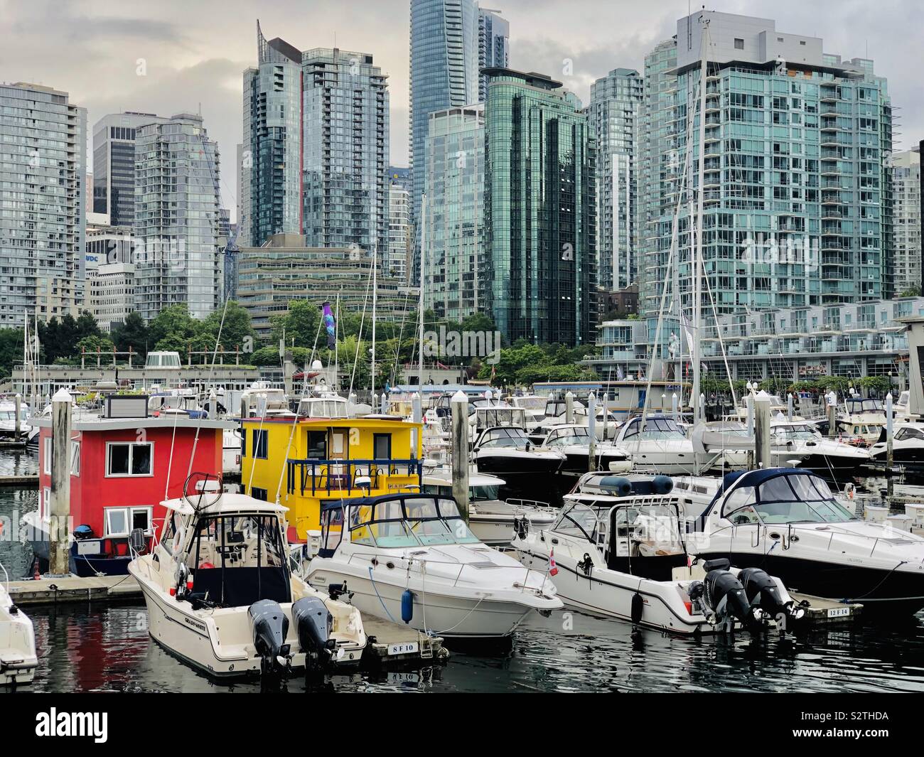 Vancouver British Columbia’s Coal Harbour and résidences make for dense population in this beautiful Canadian metropolis. - Smartphone Captured Stock Image
