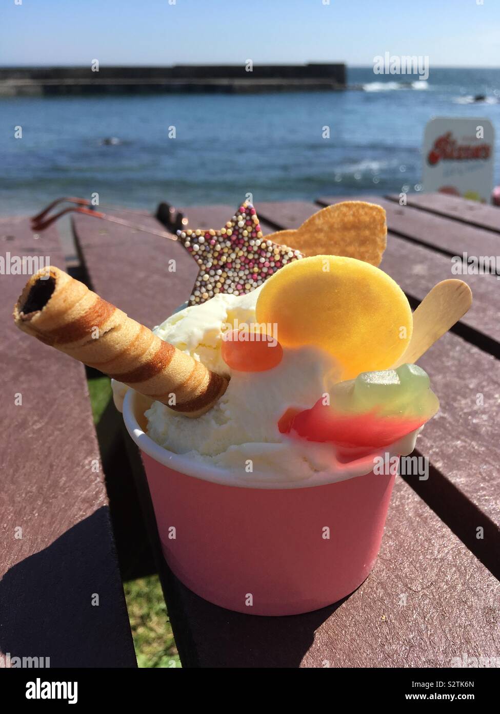 Ice cream tub with sweeties Stock Photo