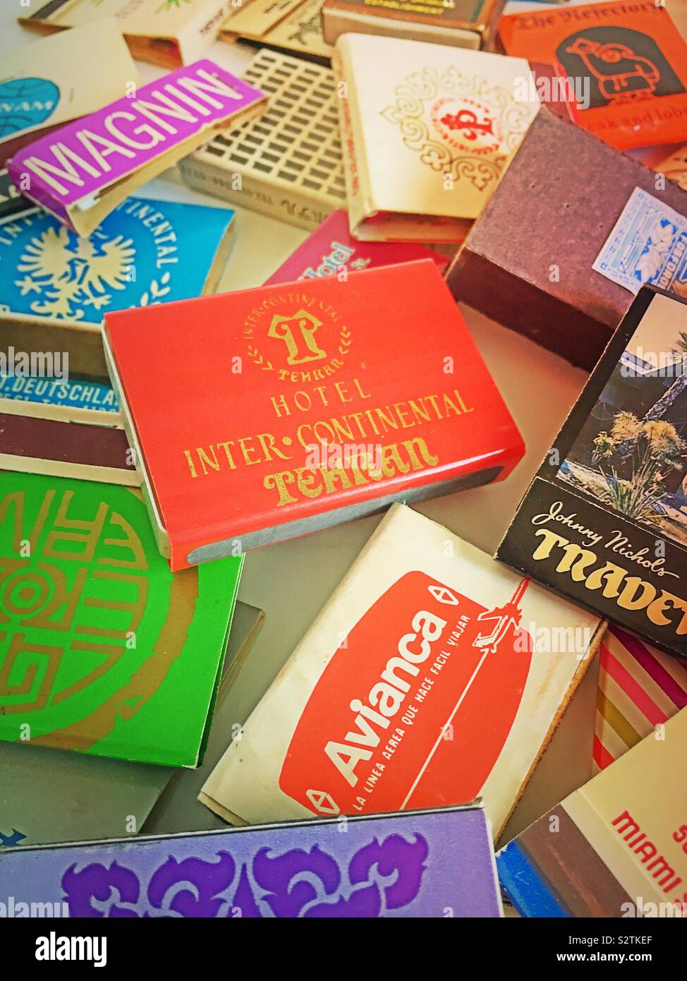 Vintage matchboxes and match books from around the world Stock Photo