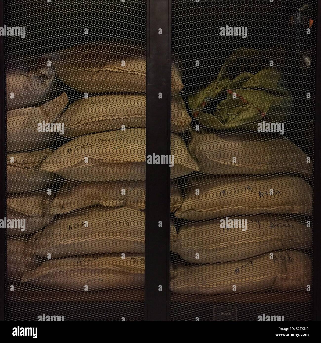 Coffee beans stored prior to roasting at Antipodean Café, a restaurant in Kuala Lumpur, Malaysia that buys its coffee beans directly from small-holding growers and roasts them in-house - Smartphone Captured Stock Image