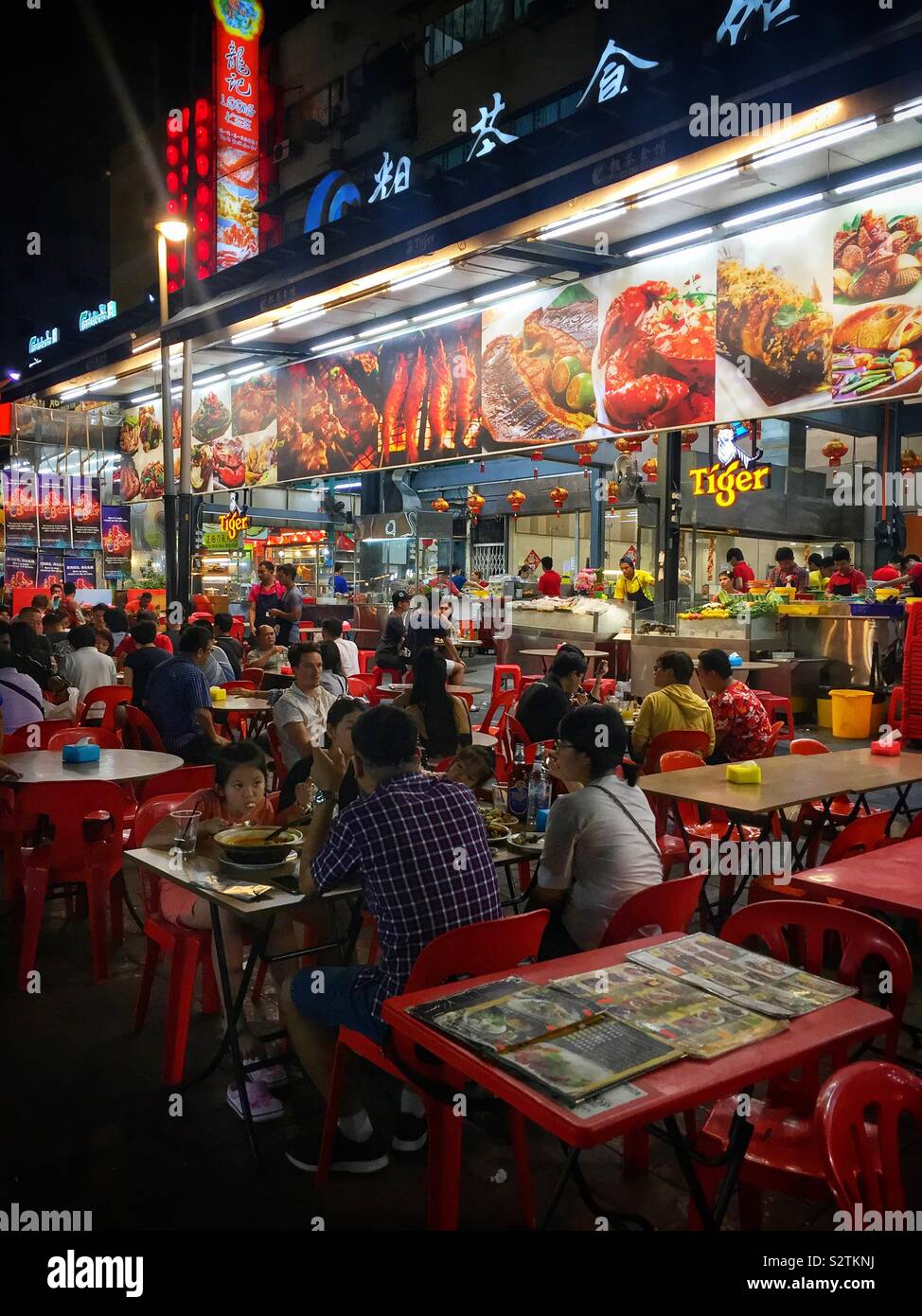 A seafood restaurant in Jalan Alor night food market, Kuala Lumpur, Malaysia - Smartphone Captured Stock Image