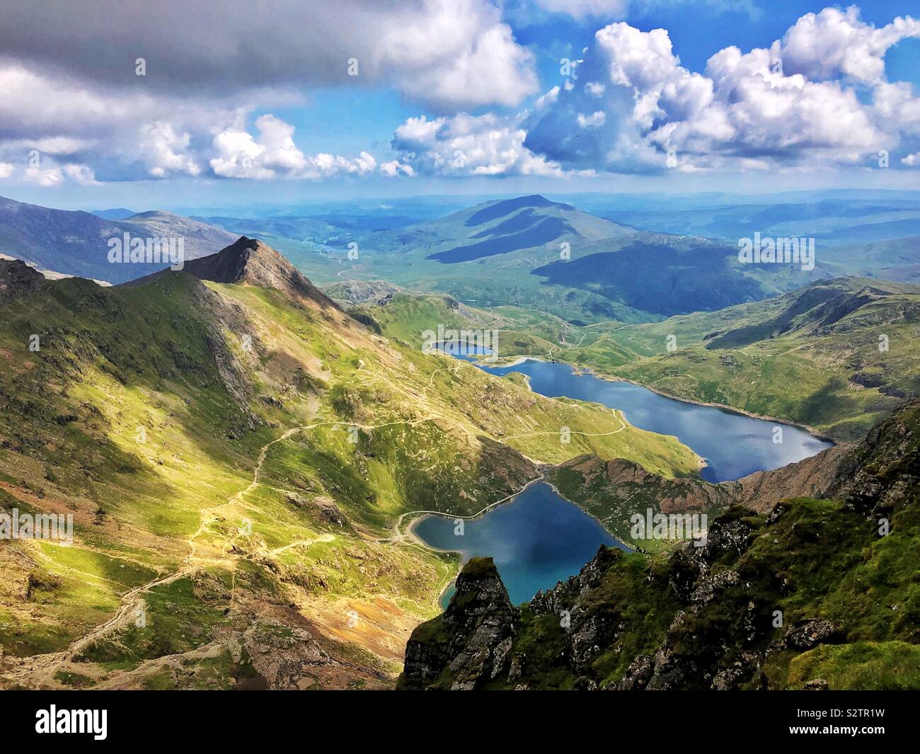 View eastwards from the peak of Snowdon over Glaslyn and Llyn Llydaw, Snowdonia National Park, August. Stock Photo
