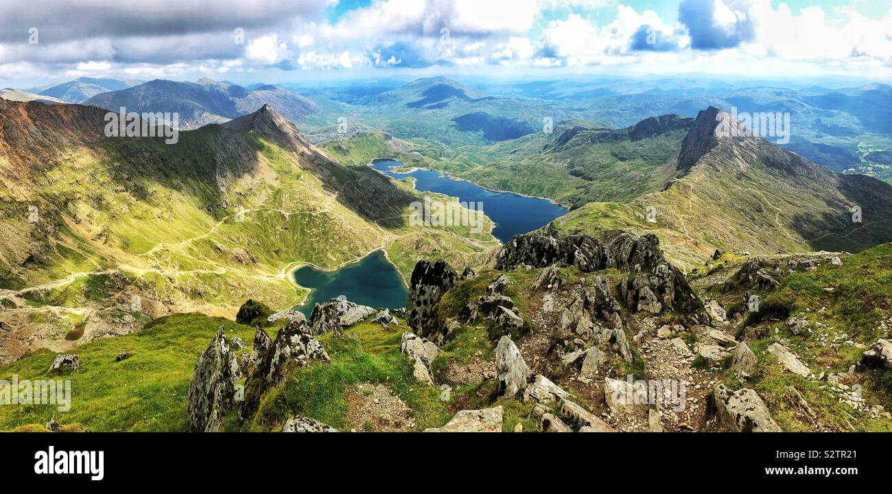 Panoramic view eastwards from the peak of Mount Snowdon over Glaslyn and Llyn Llydaw, August. Stock Photo