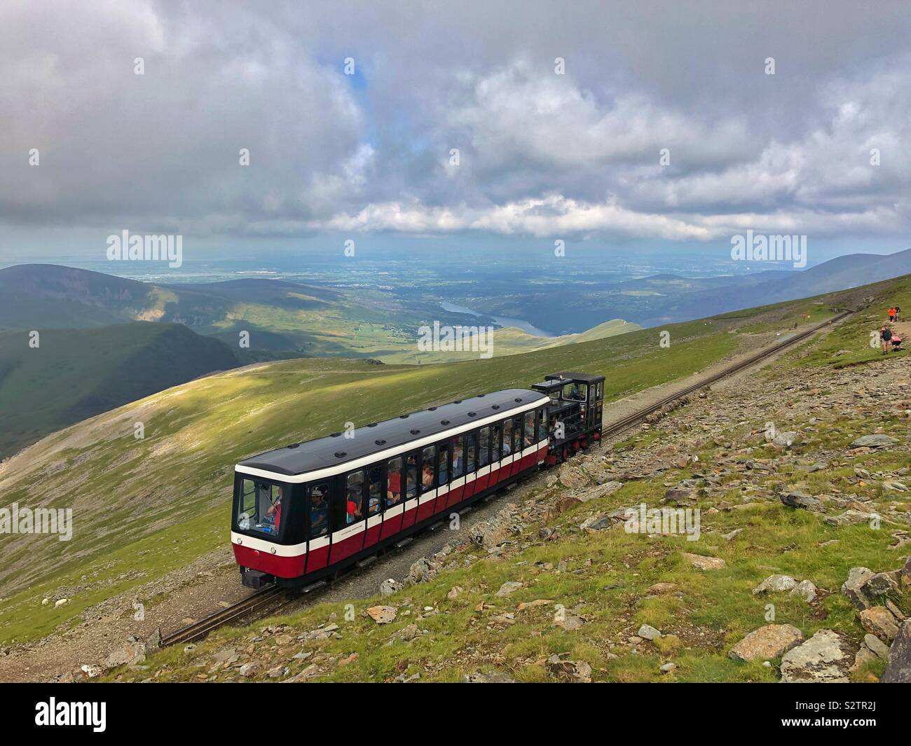Snowdon mountain railway train just leaving the peak of Mount Snowdon, August. - Smartphone Captured Stock Image