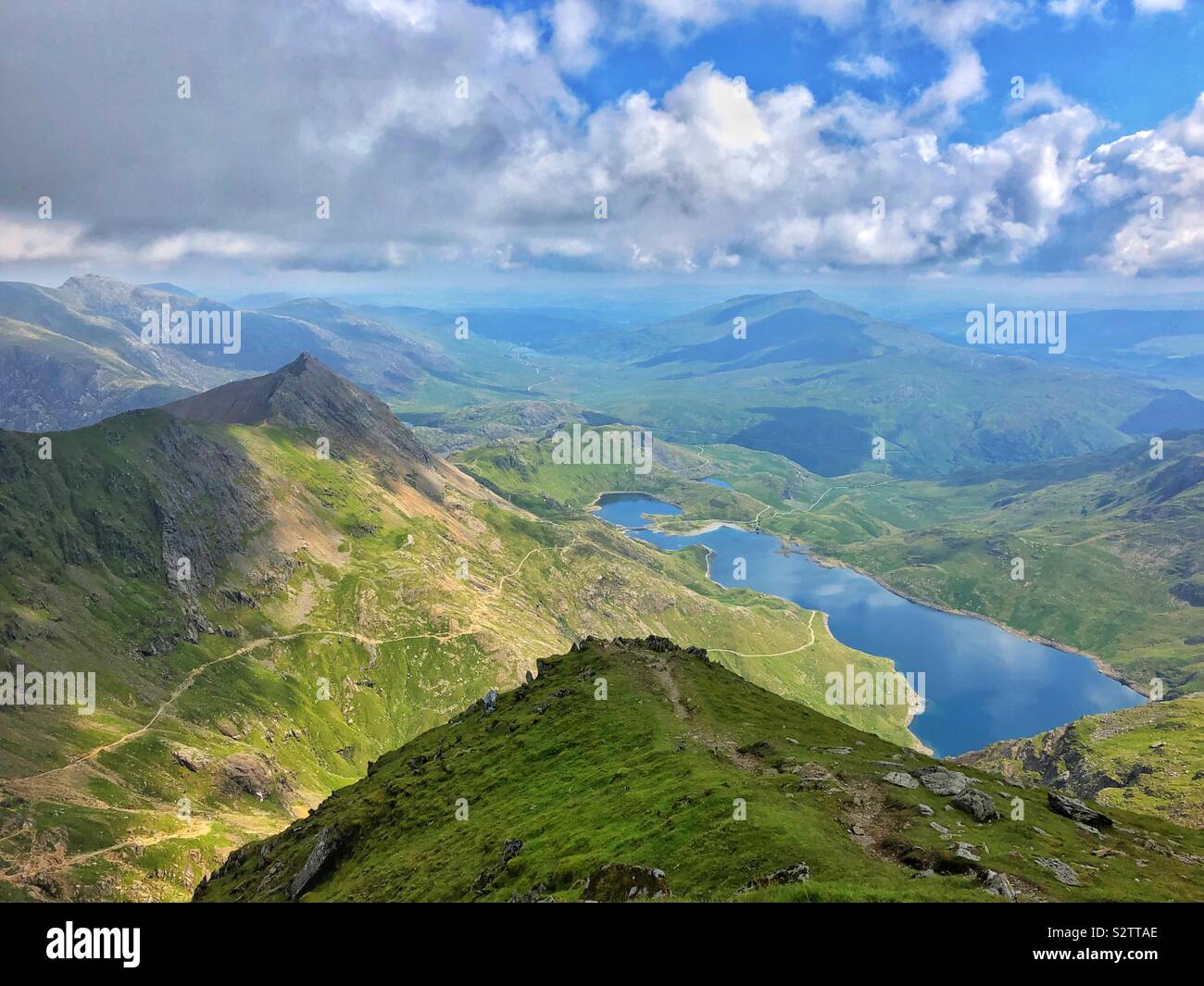 View over Llyn Llydaw and Crib Goch from the summit of Snowdon, August. - Smartphone Captured Stock Image